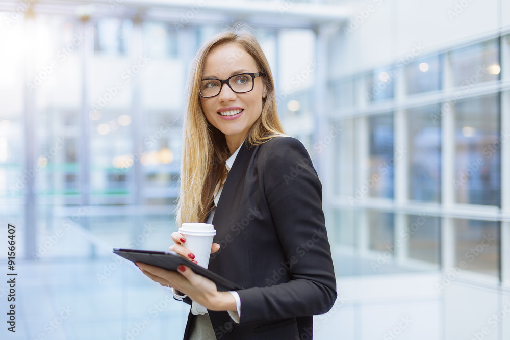 Businesswoman having a coffee break Businesswoman having a coffee break
