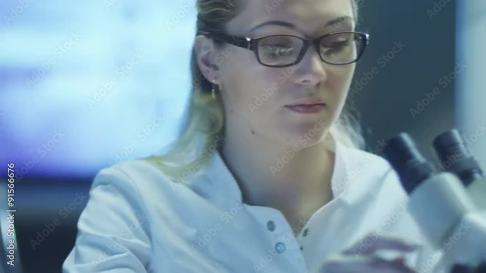 Woman Scientist using Microscope in Laboratory.
Shot on RED Cinema Camera in 4K (UHD). Woman Scientist using Microscope in Laboratory.
Shot on RED Cinema Camera in 4K (UHD).