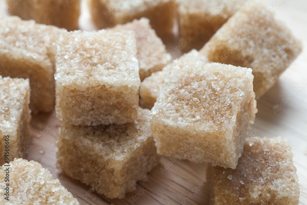 Cubes of cane sugar, Close-up. Cubes of cane sugar, Close-up.