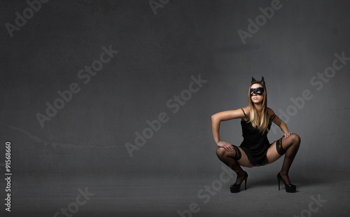 sexy model posing with black dress