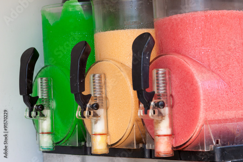 The machine gun doing the different frozen drinks