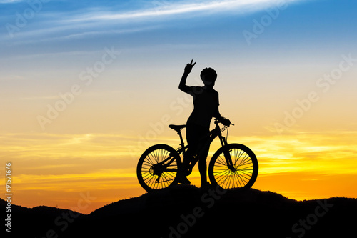 Women bike at hill mountain