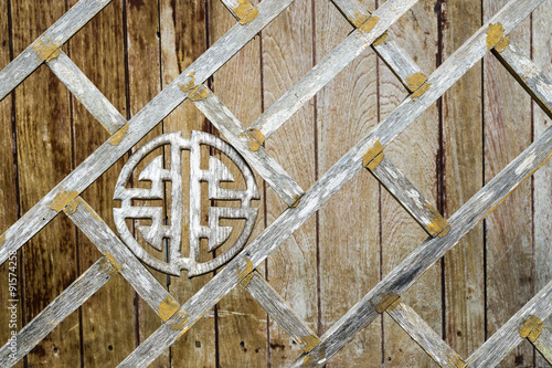The antique chinese style wooden fence in Thailand