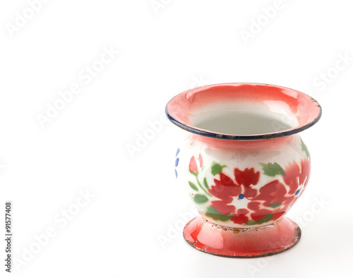  classic spittoon on white background photo