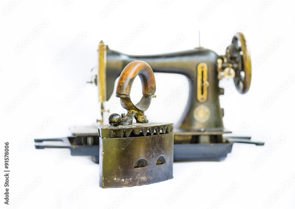 Old iron and sewing machine still life