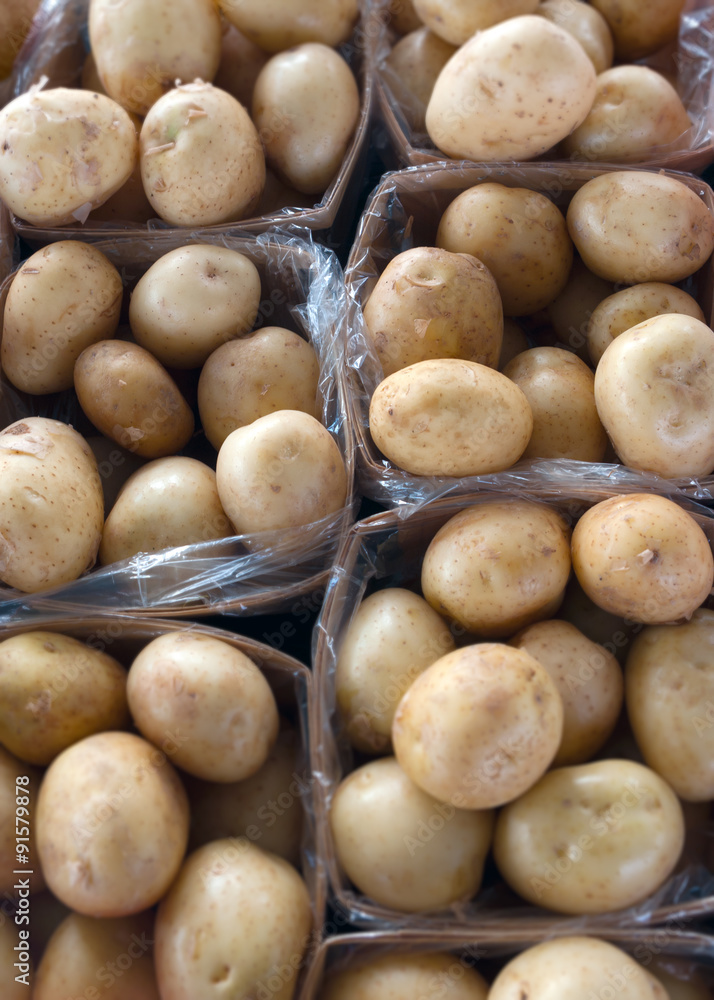 lot of white potatoes baskets market