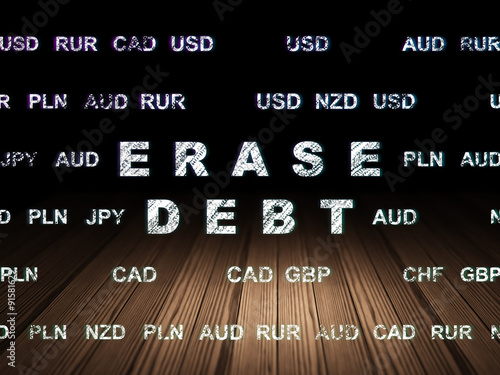 Business concept: Erase Debt in grunge dark room