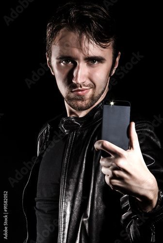 Stylish young man taking a selfie