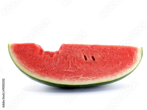 slice watermelon with bite mark isolated on white