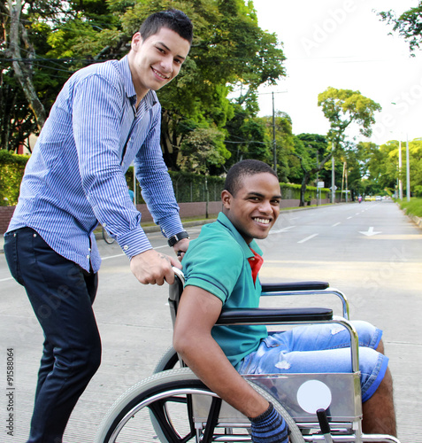 young man in a wheelchair outside