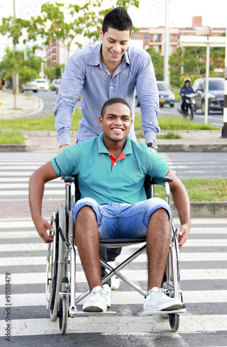 young man in a wheelchair outside