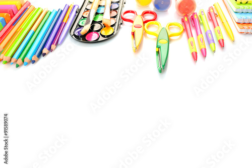 Colorful school stationery isolated on white