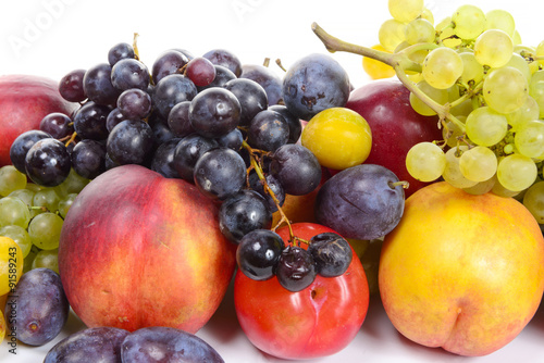 seasonal fruits, grapes, plums, pears isolated on a white backgr