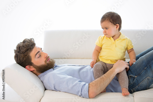 serious baby with young businessman
