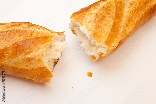 Close-up Fresh baked bread loaf broken in half