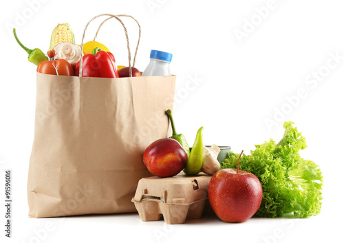 Paper bag with food isolated on white