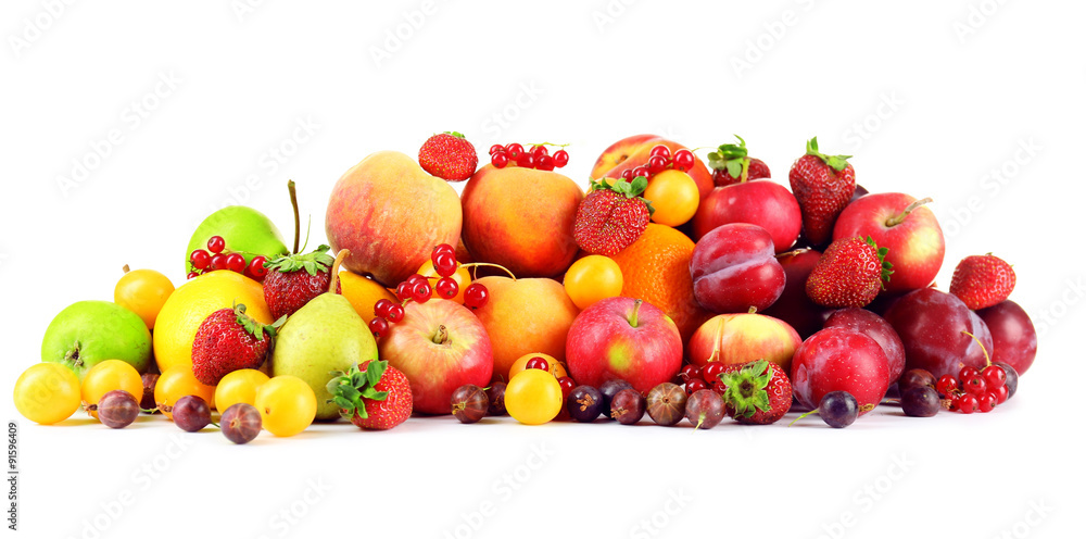 Heap of fresh fruits and berries isolated on white Heap of fresh fruits and berries isolated on white