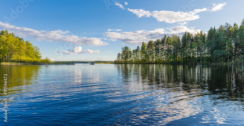 Fototapeta Naklejka Na Ścianę i Meble -  Landscape lake with reflection, clouds.