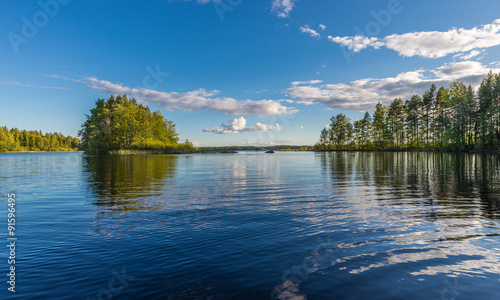 Fototapeta Naklejka Na Ścianę i Meble -  Landscape lake with reflection, clouds.