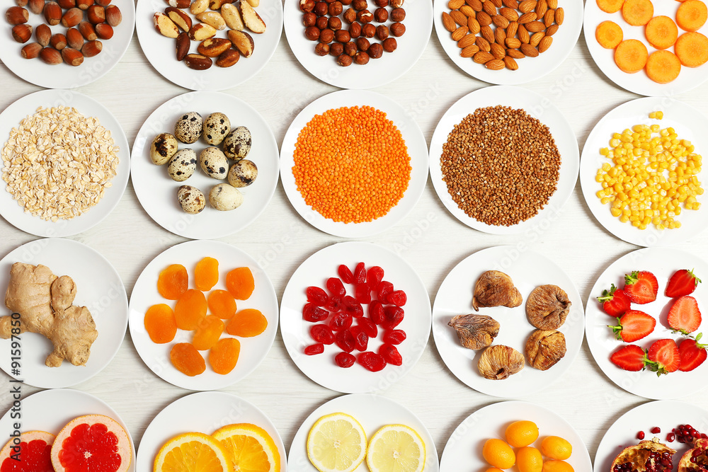 Set of orange products on wooden table, closeup Set of orange products on wooden table, closeup