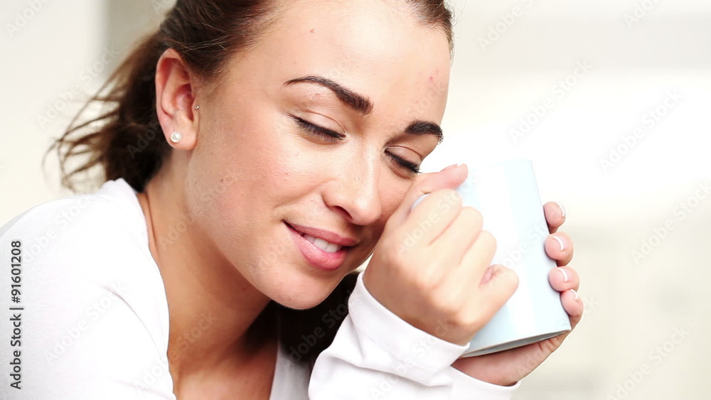 attractive woman drinking coffee at home attractive woman drinking coffee at home