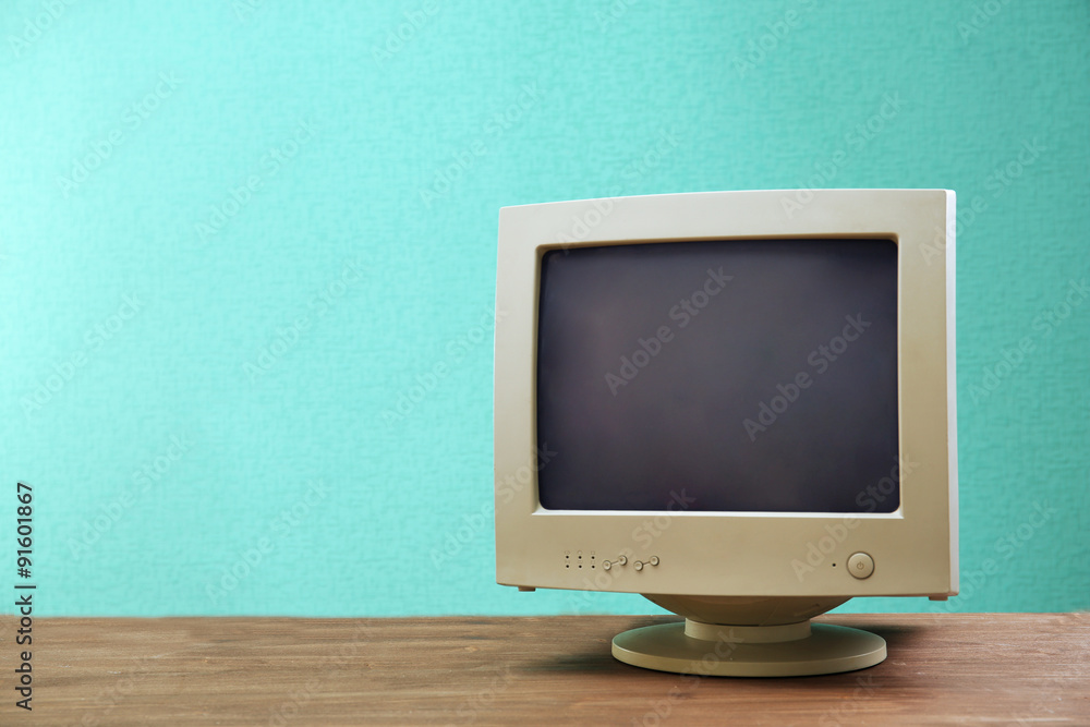 Obsolete computer set on light blue background Obsolete computer set on light blue background