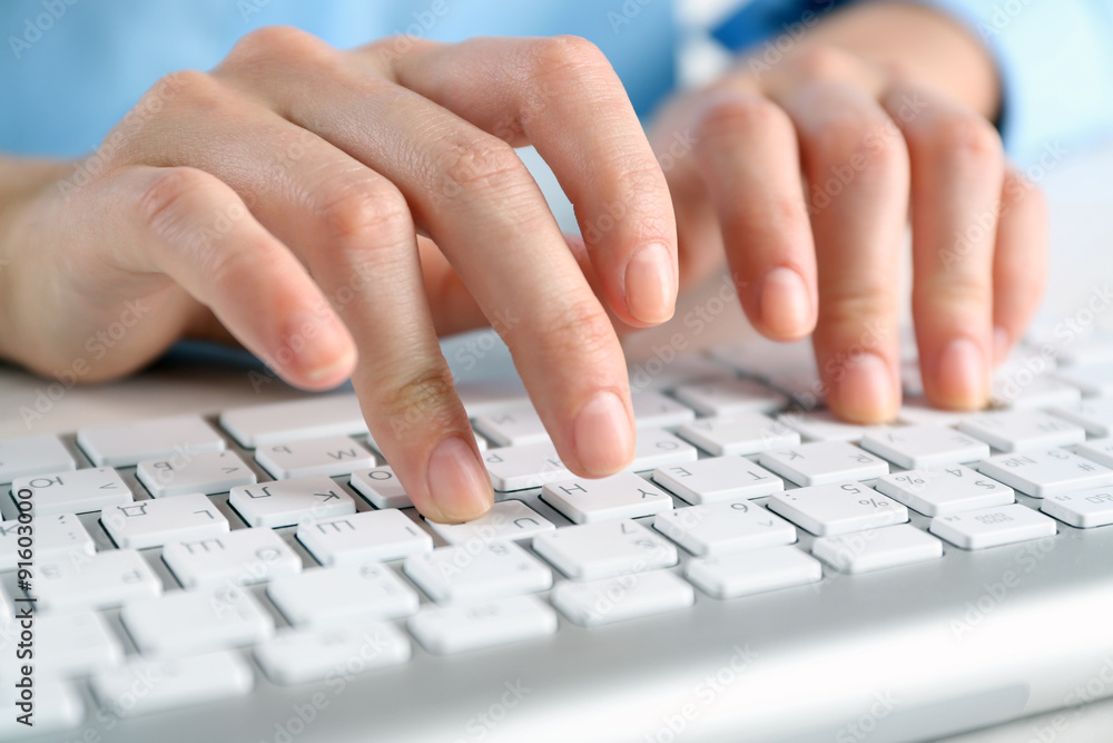 Female hands typing on keyboard close up Female hands typing on keyboard close up