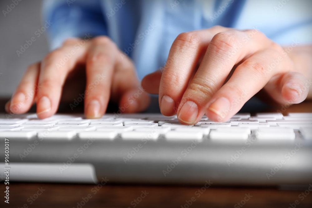 Female hands typing on keyboard close up Female hands typing on keyboard close up
