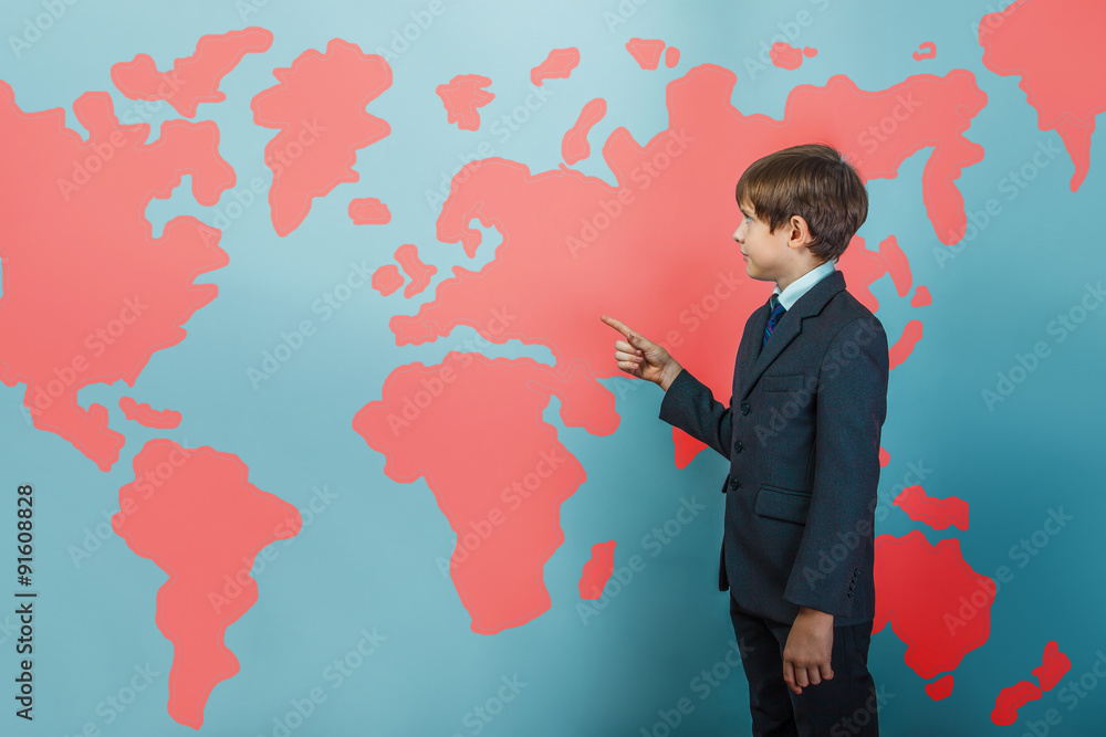 a boy of twelve European appearance in a suit holding a blank sh a boy of twelve European appearance in a suit holding a blank sh