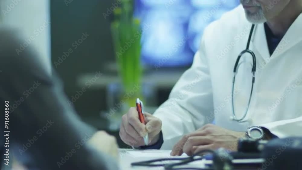 Doctor is Writing Out Medical Recipe for Patient. Shot on RED Cinema Camera in 4K (UHD). Doctor is Writing Out Medical Recipe for Patient. Shot on RED Cinema Camera in 4K (UHD).