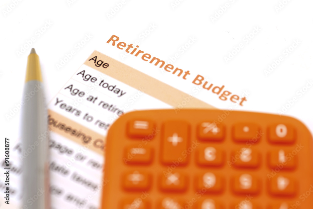 Obraz premium retirement plan document with pen and calculator