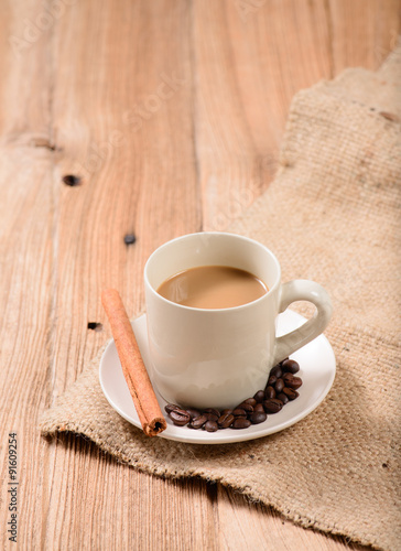 cup of coffee on wood background