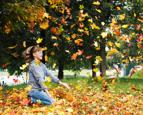 Autumn. Girl, girl and autumn leaves. Mood, happiness, joy