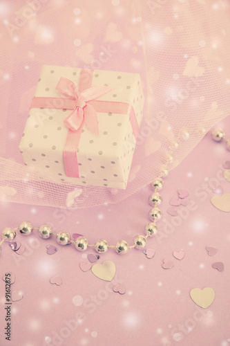 Beautiful little gift box on pink background © Africa Studio