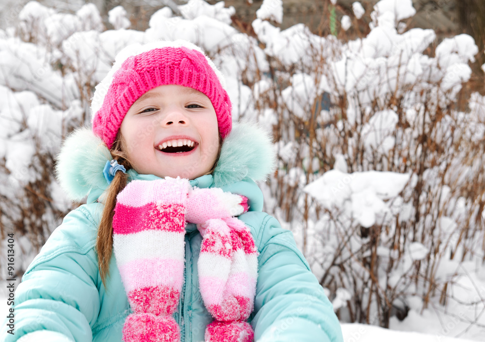 Portrait of smiling little girl in winter day Portrait of smiling little girl in winter day