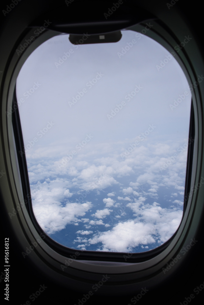 Clouds and sky from airplane window Clouds and sky from airplane window