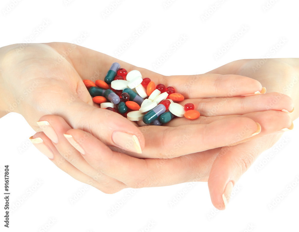 Stack of different pills in woman hands Stack of different pills in woman hands