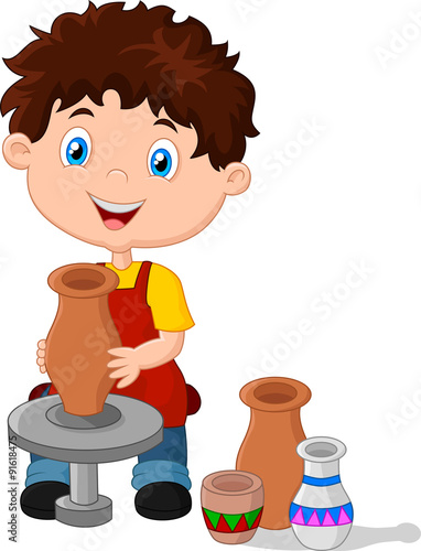 Happy little boy creating a vase on a pottery wheel 
