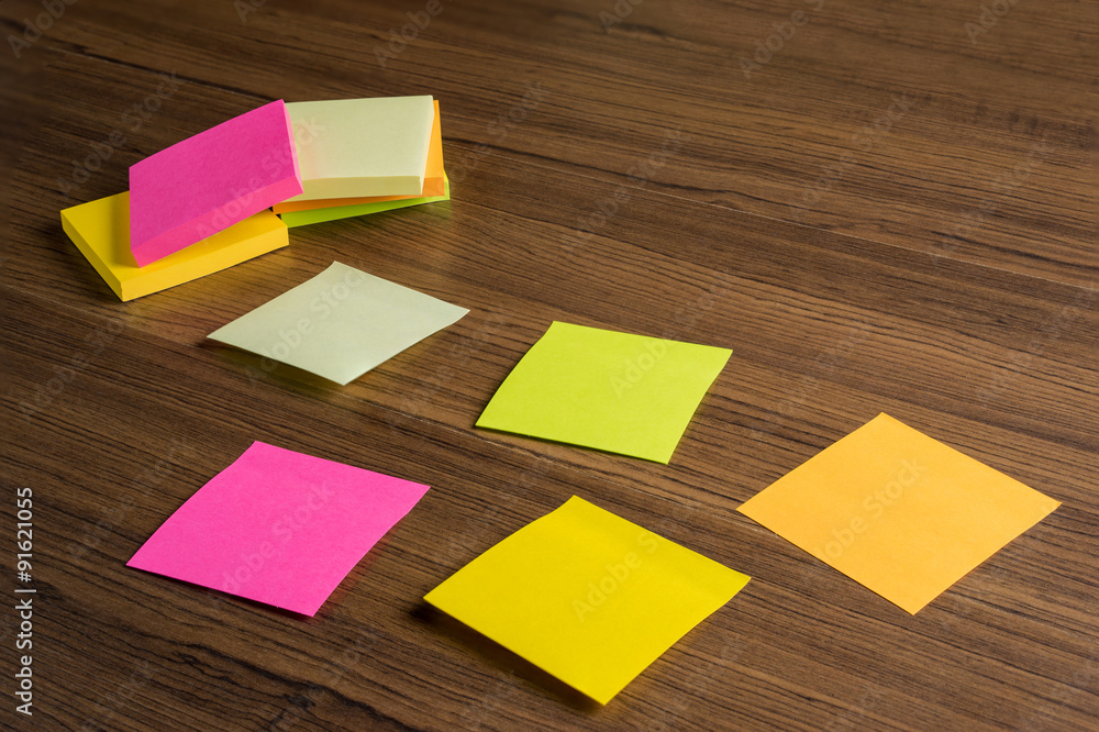 Sticks note paper on wood background Sticks note paper on wood background
