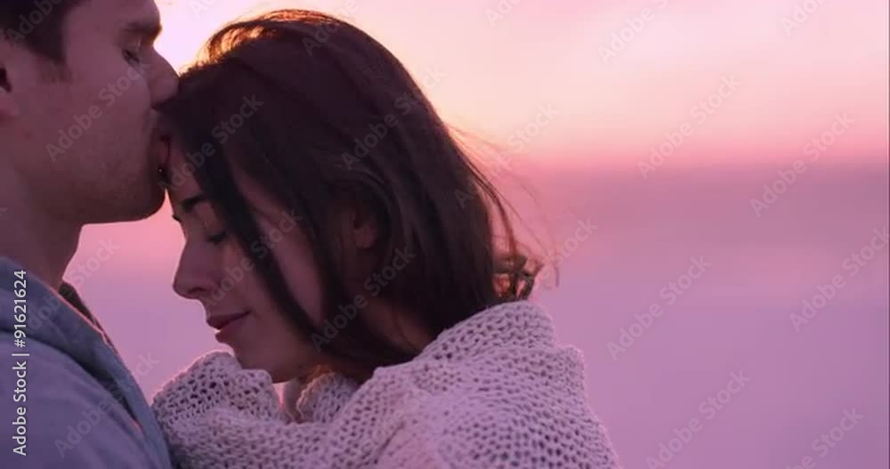 Unhappy couple embracing woman being comforted by partner is sad on beach at sunset slow motion RED DRAGON