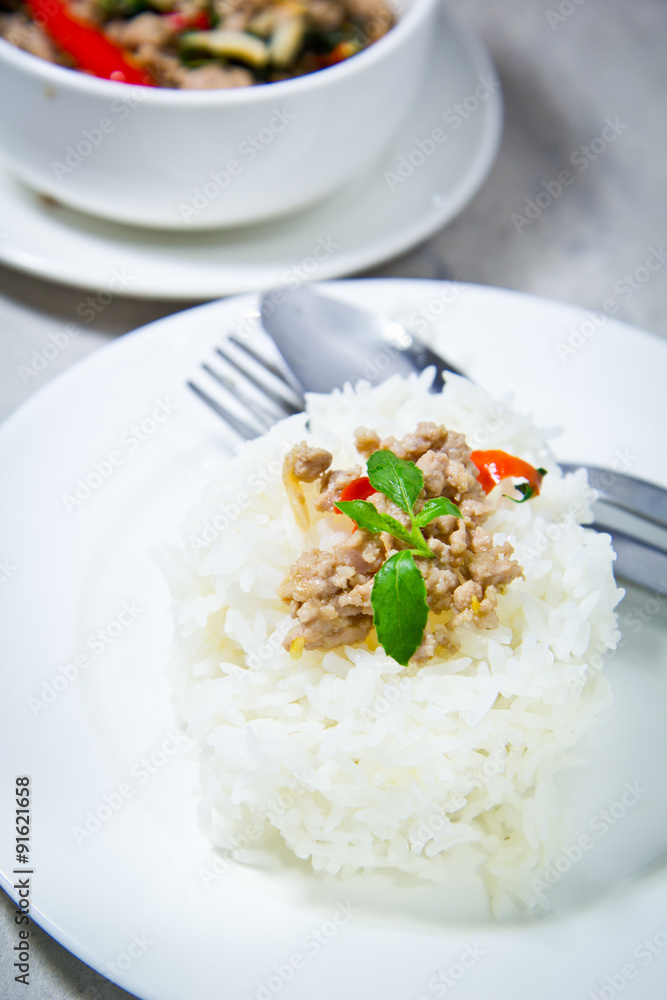 spicy pork with hot basil on stream jasmine rice spicy pork with hot basil on stream jasmine rice