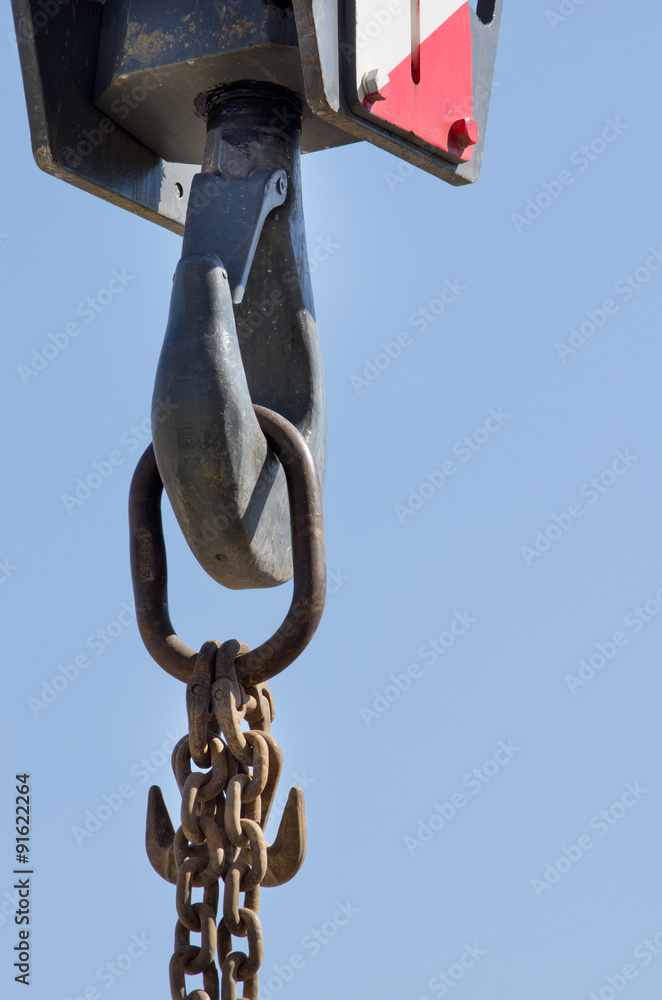 Fototapeta premium Crane hook against blue sky