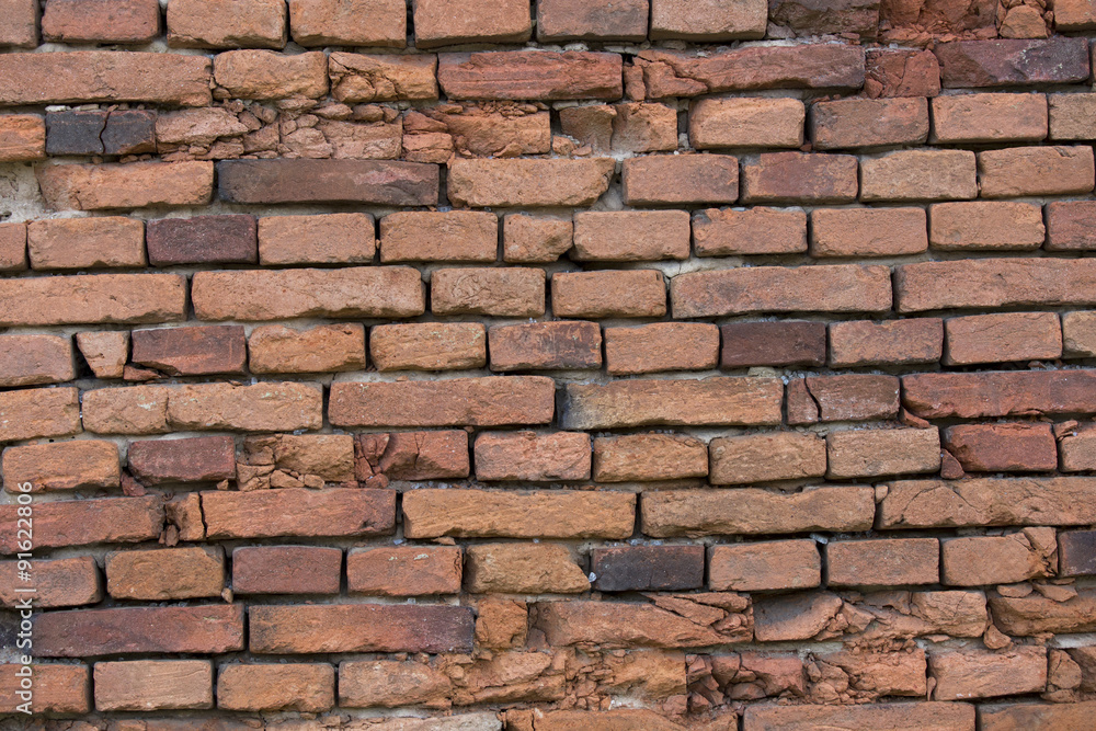 Fototapeta premium Ziegelmauer einer alten Scheune