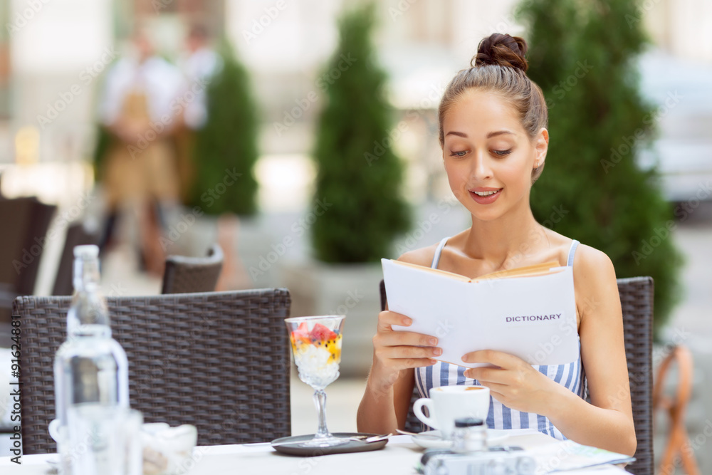 Nice girl sitting in the cafe Nice girl sitting in the cafe