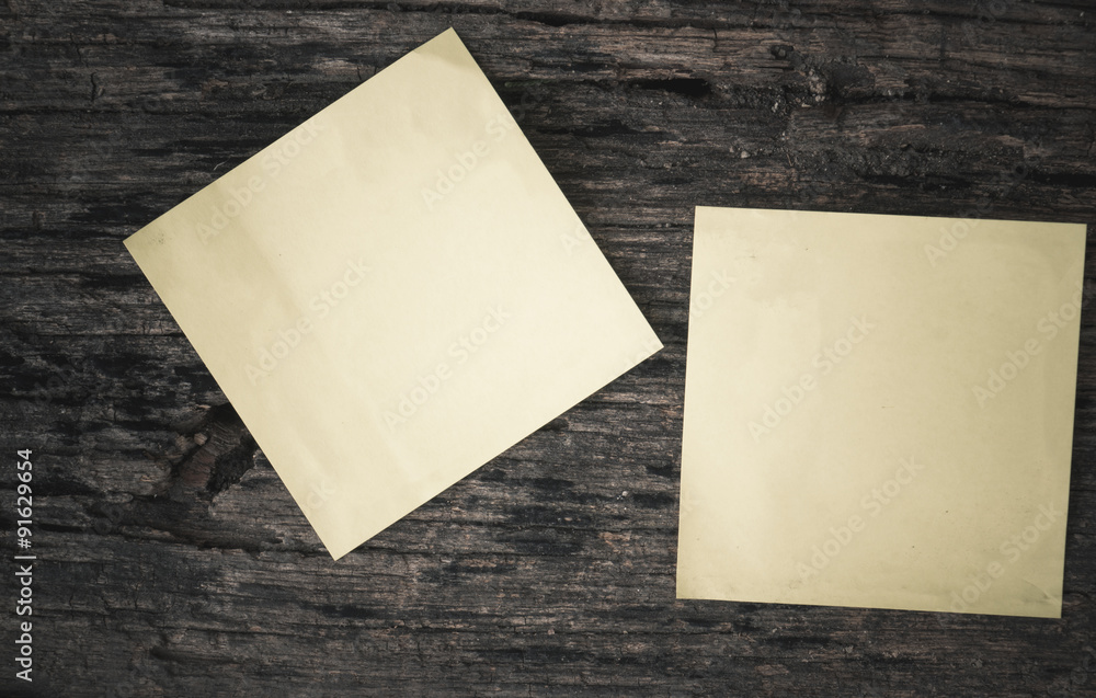 Blank paper put on wooden for put your text. Blank paper put on wooden for put your text.