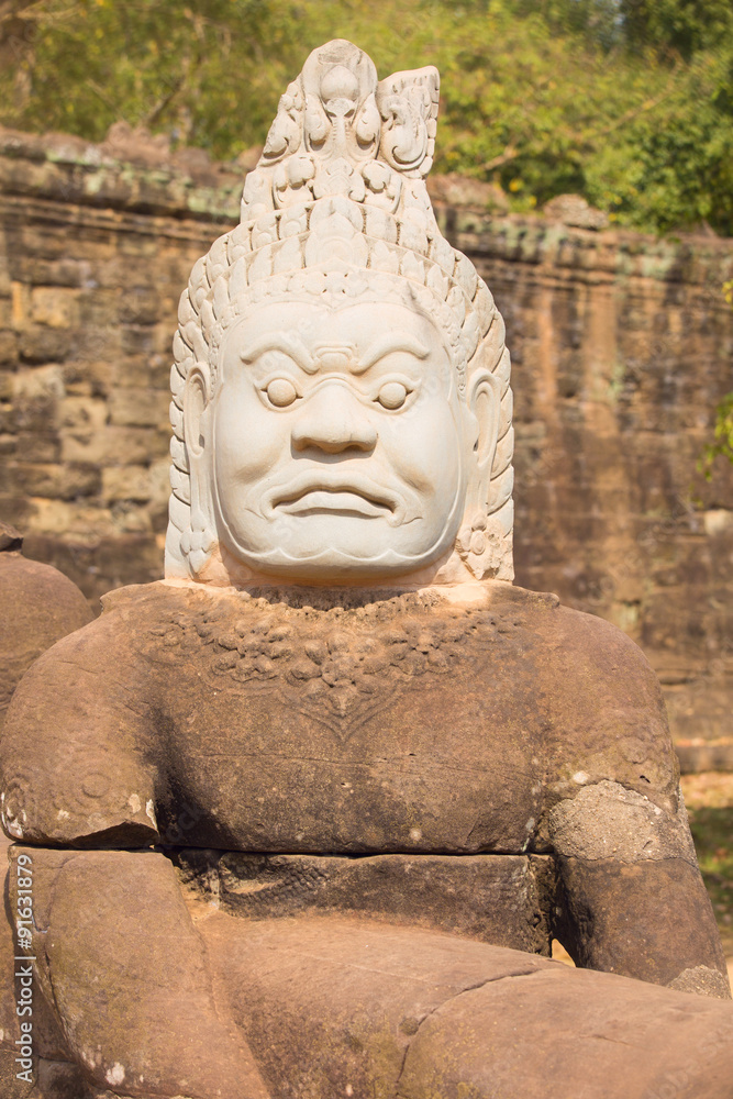 Statue of ancient khmer warrior head at Angkor Wat