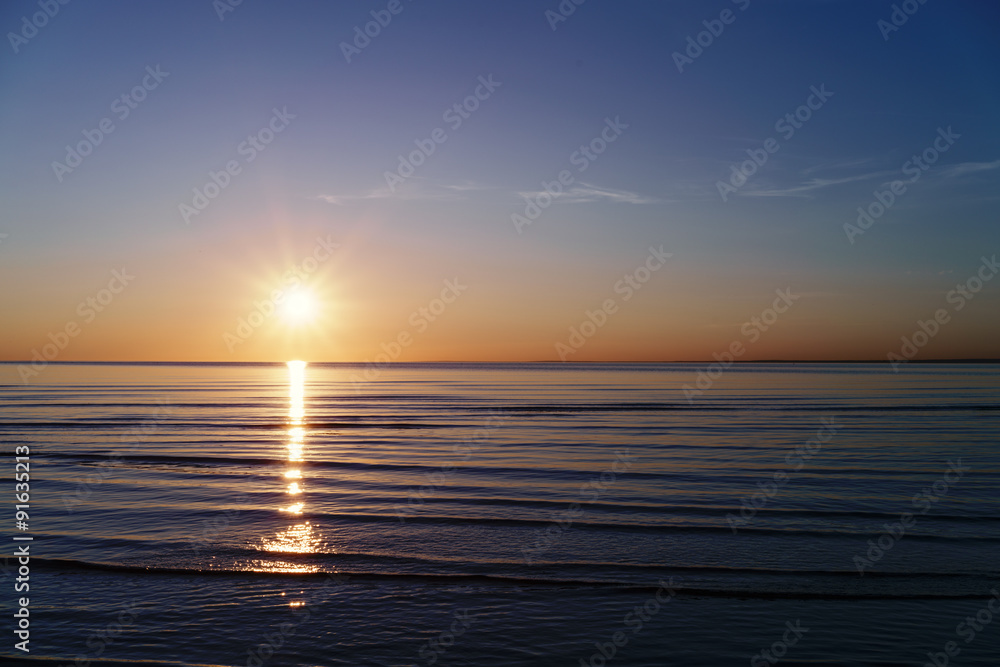 sunset on baltic sea beach