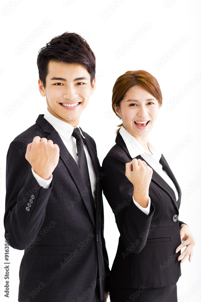 happy business man and woman standing in office happy business man and woman standing in office