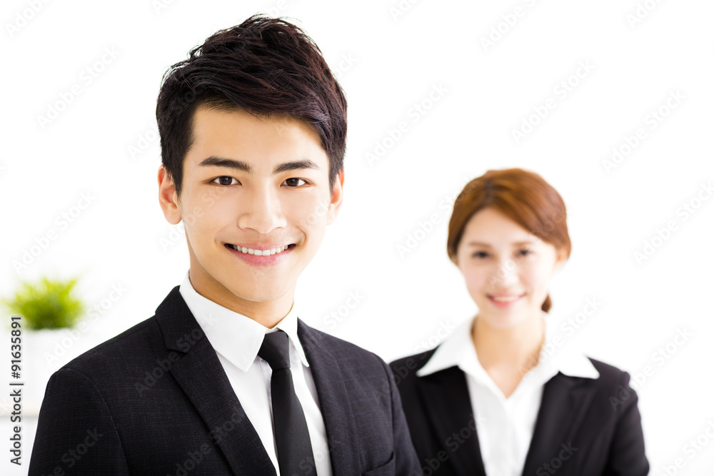 happy business man and woman standing in office happy business man and woman standing in office
