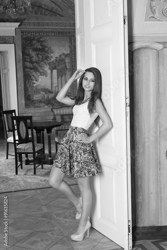 woman in aristocratic room BW